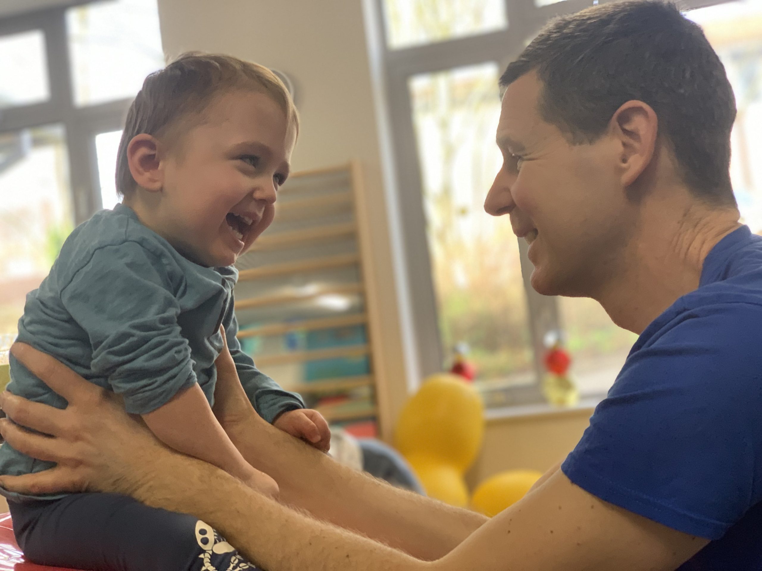 Otis on a bouncy ball during a physiotherapy session.