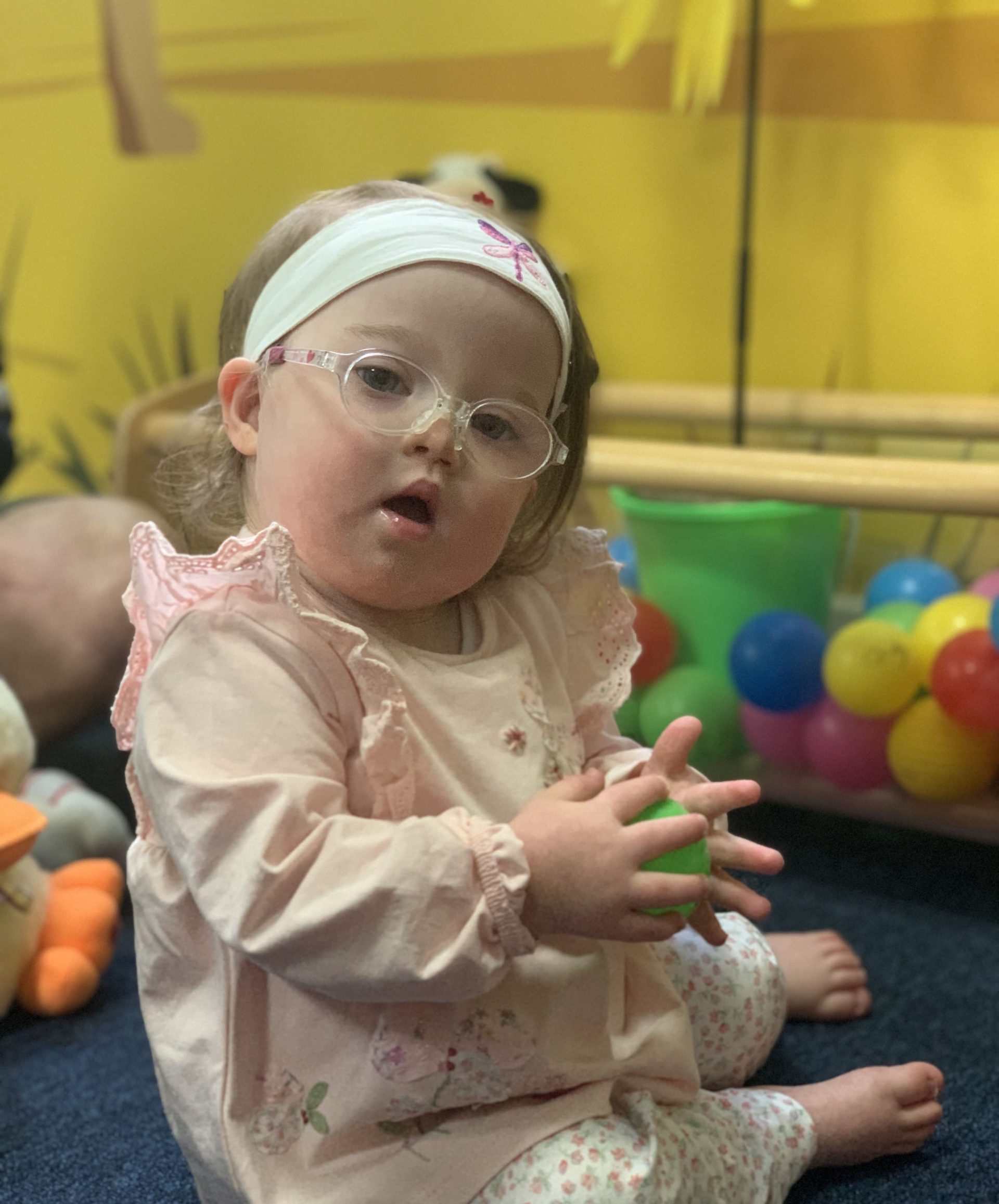 A young girl with Downs Syndrome.